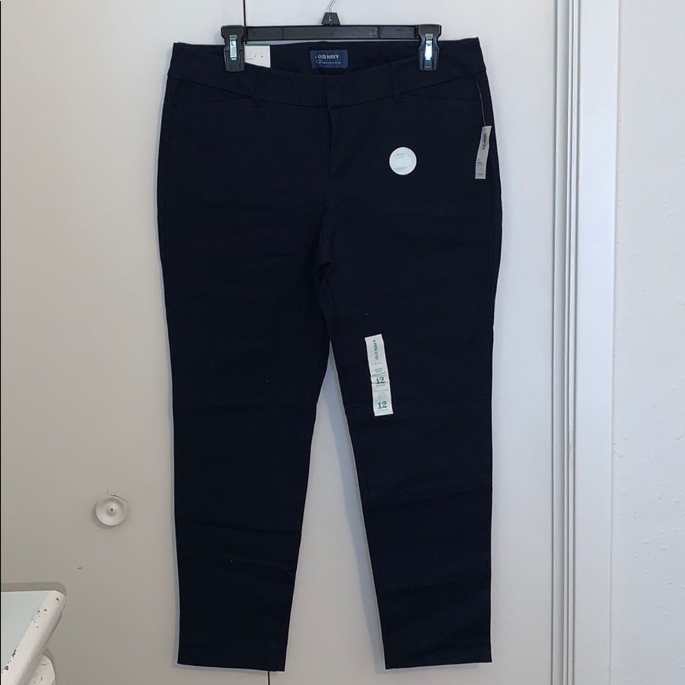 Navy blue, ankle length, mid rise, standard fit